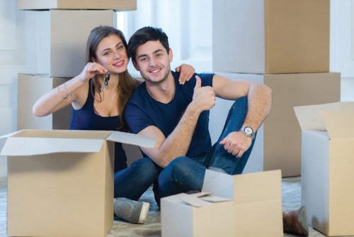 Moving van and boxes for a home move in Colliers Wood