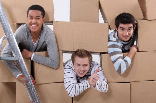 Home removal transport service in Colliers Wood with packed boxes