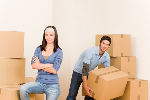 Professional team removing furniture from a Colliers Wood flat