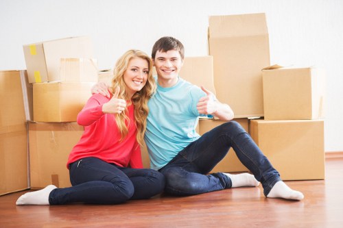 Packing and loading household items for a flat move in Colliers Wood