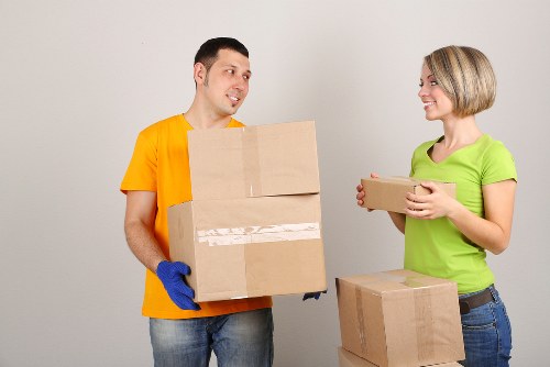 Local packing team working in a flat near Colliers Wood