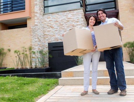 Urgent home relocation service with movers carrying items in Collierswood